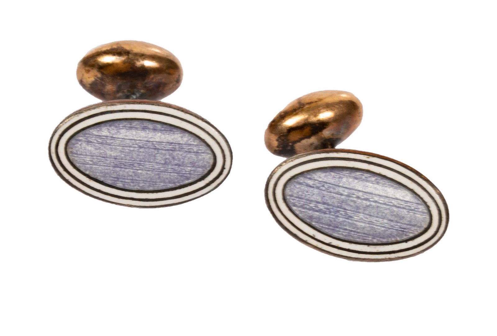 Art Deco Sterling Guilloche Enamel Cufflinks: Item/Description: Deco era gilt wash Sterling Silver cufflinks in rare lavender guilloche enamel with white border. Oval lozenge shape. Rigid toggle segment. Unmarked. Material: Sterling silver (teste
