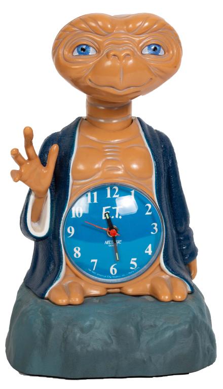 Nelsonic "E.T." The Extraterrestrial Alarm Clock: Item/Description: Nelsonic Quartz ET alarm clock. Universal City Studios. Figural clock features E.T. the Extra-Terrestrial (or simply E.T.) from the 1982 American science fiction film. Material: Plas