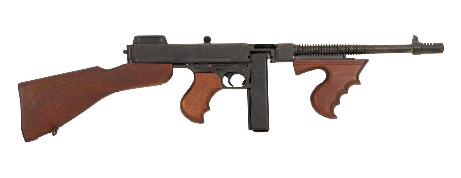 MGC Replica Model 1921 Thompson Submachine Toy Gun: Item/Description: A toy replica model of the 1921 Thomson submachine gun, made by MGC Model Gun Corp. Material: Metal, wood Dimensions: Length: 34"; Width: 2"; Height: 7" Condition: Spotting and wear 