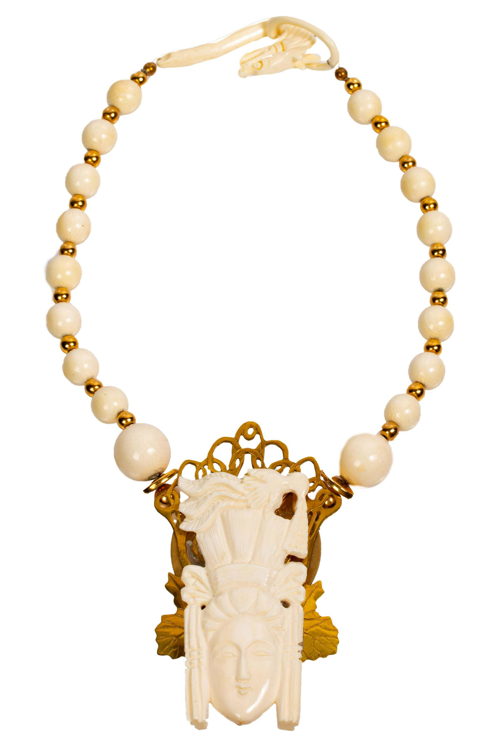 Carved Hindu Krishna Goddess Pendant Choker: Item/Description: Fabulous ornamental pendant choker necklace of resin celluloid features an elaborately carved face of a Hindu goddess deity with elaborate headdress on a gold tone and brass backplat