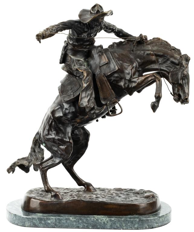 Bronco Buster - Bronze After Frederic Remington: Item/Description: After Frederic Remington (American, 1861-1909) patinated bronze sculpture, The Bronco Buster. Inscribed on base: Frederic Remington. Mounted to marble base. Material: Bronze, marble 