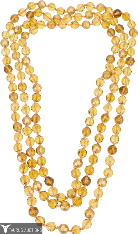 Antique Art Deco Golden Crystal Bead Necklace: Item/Description: Exquisite, long antique Art Deco Retro era endless over-the-head crystal necklace. Faceted golden yellow crystal beads, some gilt painted. Hand-knotted on orange twine. Unusual color