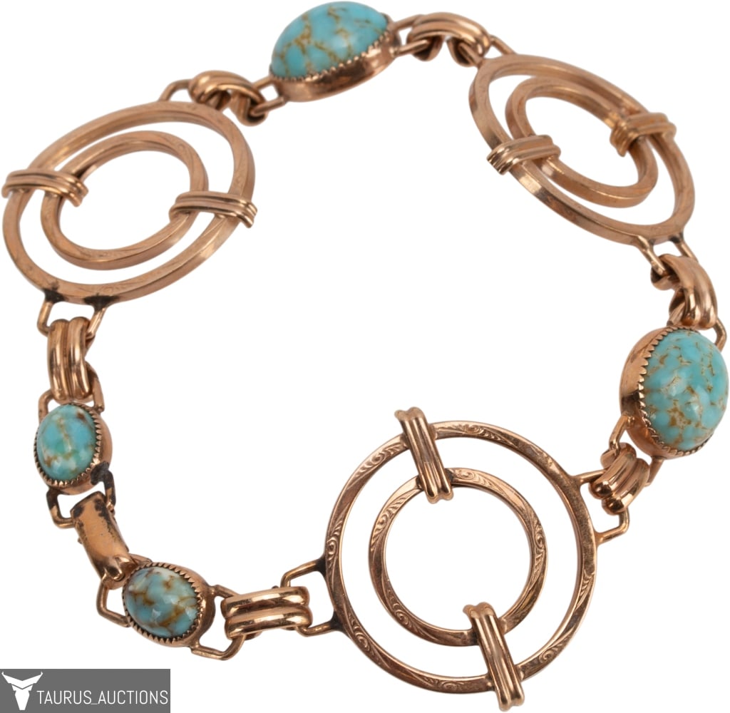 D'eri Retro 12K Gold Filled Turquoise Bracelet: Item/Description: Sleek signed D'eri Retro era link bracelet. Crafted in 12K gold filled metal the bracelet is comprised of floral embossed circular stations alternating with bezel set faux turquoise 