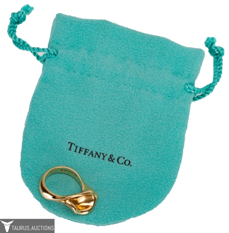 Tiffany & Co. Elsa Peretti 18K Calla Lily Ring: Item/Description: Exquisite signed Elsa Peretti for Tiffany & Company sculptural calla lily flower ring. Fashioned from 18K yellow gold. Organic, free-form fluid design. Hallmarked: Peretti Tiffany & 