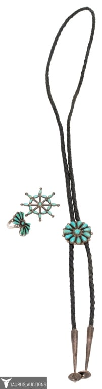 Zuni Sterling & Turquoise Petit Point Lot: Item/Description: Southwestern Zuni sterling and turquoise lot includes a brooch, ring and bolo. The pin designed as a wheel, dream catcher is set with petit point teardrop sky blue turquoise stones s