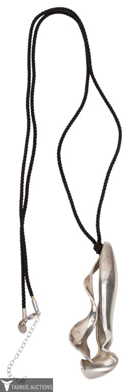 Tiffany & Co. Frank Gehry Sterling Orchid Pendant: Item/Description: Exquisite signed figural orchid pendant by Canadian designer and architect, Frank Gehry, for Tiffany and Company. Limited, retired design in Sterling Silver, figural flower orchid. T