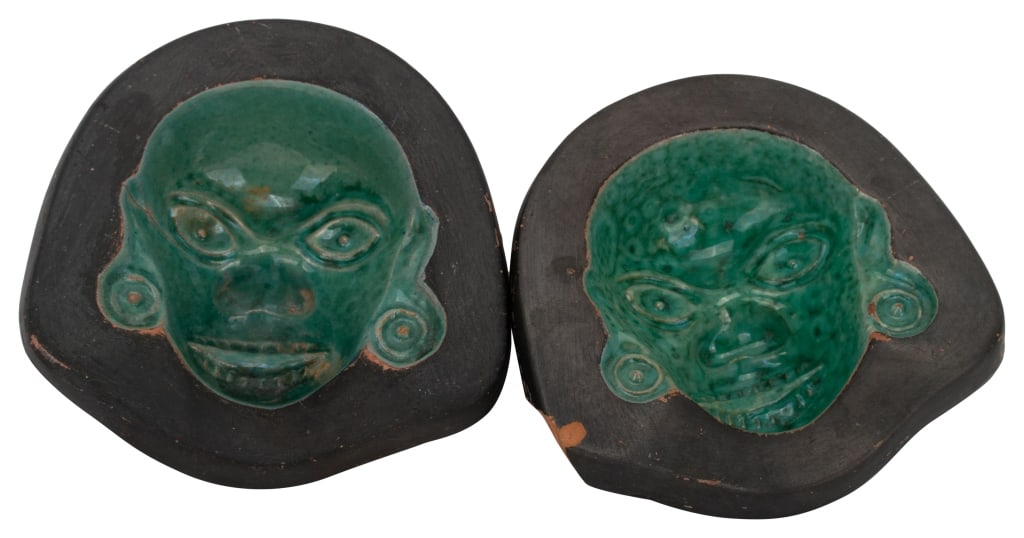 Texcoco Ehecatl Aztec Ashtray Trinket Dish - Pair: Item/Description: Signed Texcoco Mexican clay pottery ashtray trinket dishes. Crafted from clay with matte and glazed surfaces. Feature inverse carved face of Ehecatl Quetzalcoatl, the Aztec God. Gree
