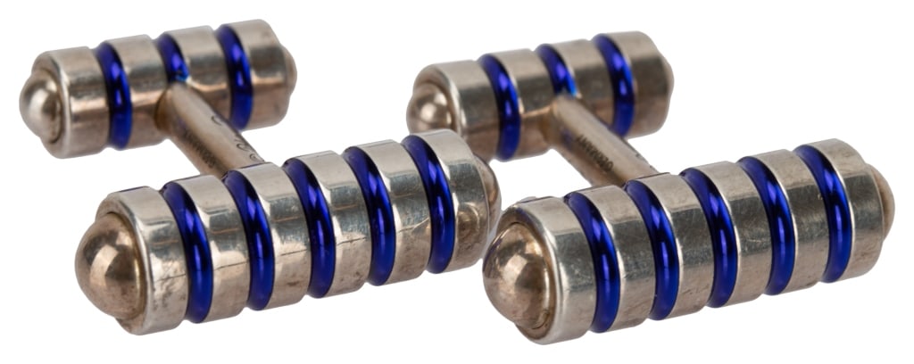 Tiffany & Co. Paloma Picasso Sterling Cufflinks: Item/Description: Luxury designer Paloma Picasso for Tiffany & Company groove barrel cufflinks. Crafted in Sterling Silver in a toggle design, grooves filled with cobalt blue enamel. Rigid design. Sle