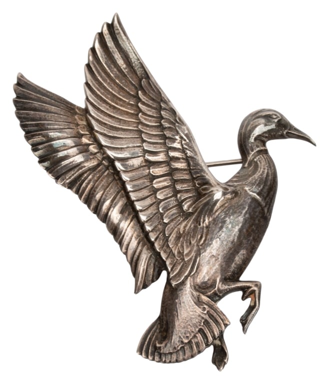 Signed Lynn Bogue Hunt Sterling Duck Brooch: Item/Description: Signed Sterling Silver mallard duck pin in flight by renowned wildlife artist and illustrator, Lynn Bogue Hunt (1878-1960). Realistic and exquisitely crafted from Sterling Silver. Th