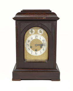 Junghans Mantle Clock, Germany: Item/Description: Beautiful German made 1912 Junghans Mantle Clock. The movement is marked Junghans J (in a star burst)/ B12 / 140. Brass scrolling foliate face under a beveled arch shaped door. Wood