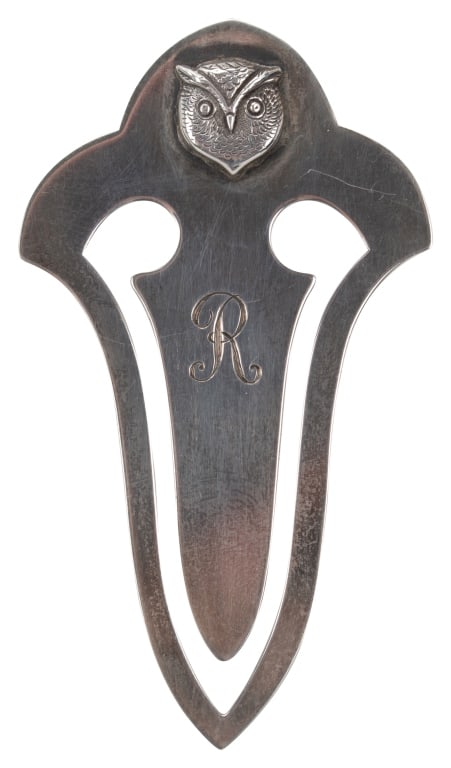 Georg Jensen USA Sterling Owl 17 Bookmark: Item/Description: Sleek Georg Jensen page marker bookmark crafted from Sterling Silver. Arrow shaped resembling a fleur-de-lis, soft curves give a nod to Art Nouveau era. Cut-out design. Crown has an 