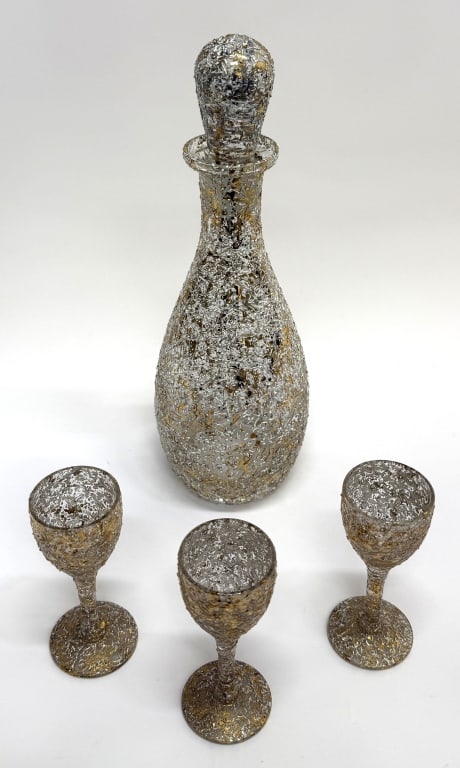 West Virginia Glass Decanter & Three Glasses: Item/Description: West Virginia Glass decanter and three glasses. WVG20 pattern with gold and white splatter paint crackled glass design. The West Virginia Glass Company was founded in 1965 by Bob Cer