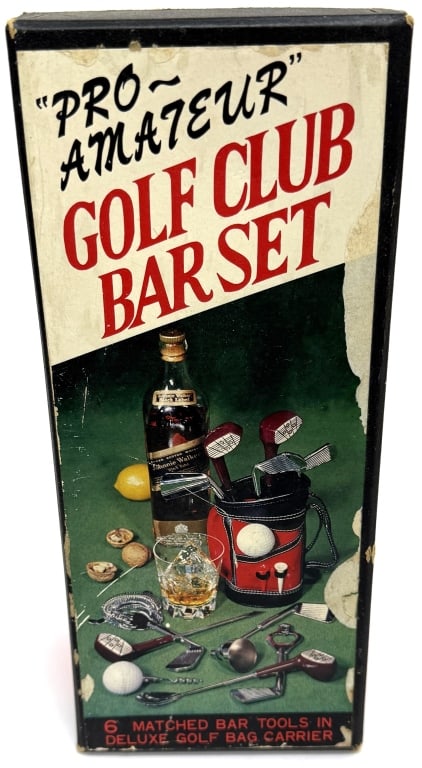 1970s "Pro-Amateur" Golf Club Bar Tool Set: Item/Description: Vintage "Pro-Amateur" Golf Club Bar Set. This novelty item includes six various bar tools designed to look like miniature golf clubs, housed in a small golf bag carrier.Material: Met