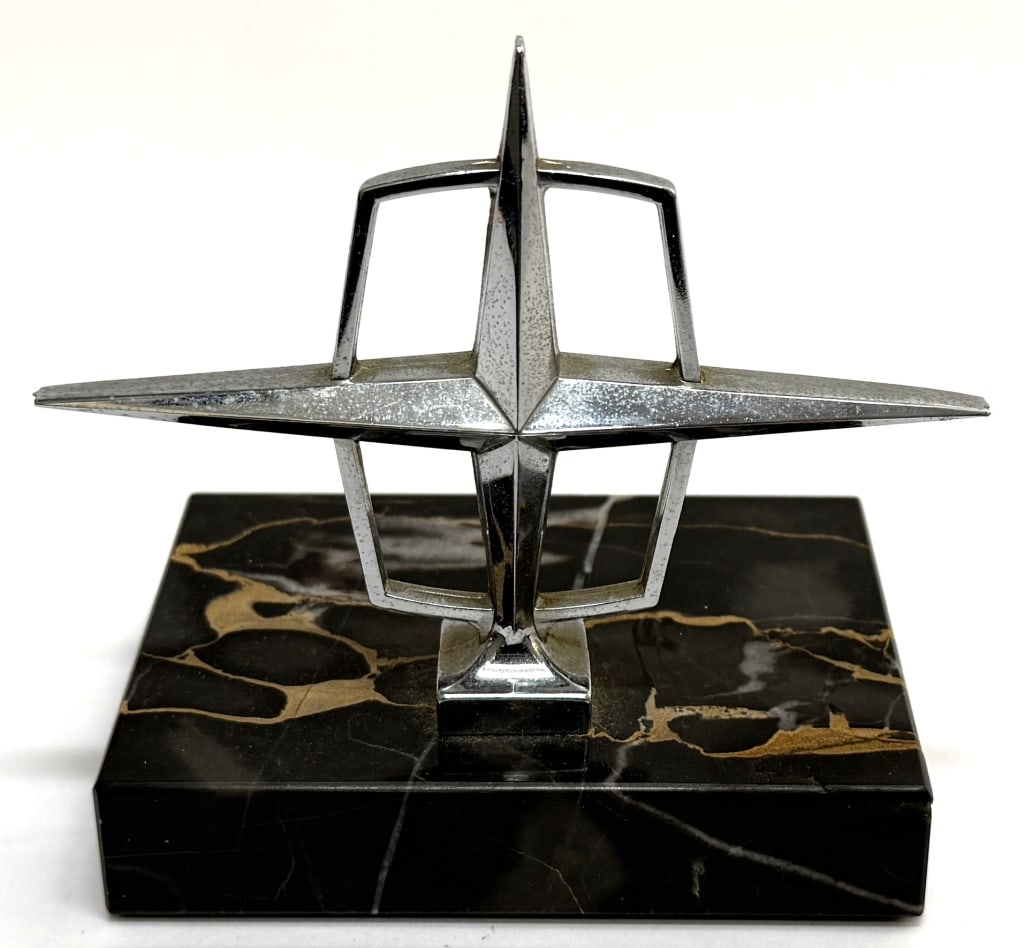 1960s Lincoln Continental Hood Ornament on Marble: Item/Description: Vintage Lincoln Continental hood ornament that has been mounted on a marble base, as a dealership salesperson award from the 1960s. Made exclusively for Lincoln Continental by "Spike