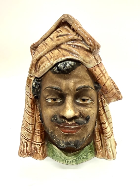 Antique 1890s Berber Figural Tobacco Jar: Item/Description: Antique figural humidor tobacco jar of a North African nomad wearing a Berber head dress. Underside marked 55. Antique tobacco jars were immensely popular in the mid-to-late 19th cen