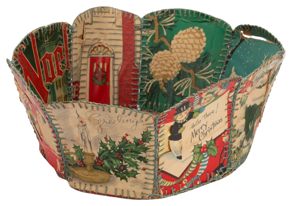 Vintage Handmade Folk Art Christmas Card Basket: Item/Description: Christmas card bowl made from vintage Christmas cards sewn together with heavy thread or yarn. Features various seasonal and holiday scenes. Material: Paper, Thread Dimensions: Lengt