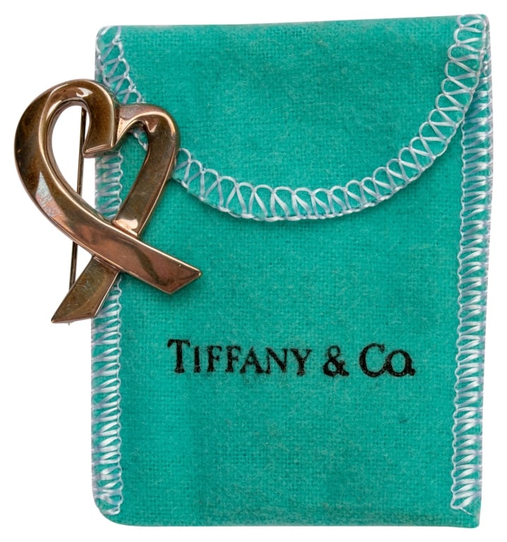 Tiffany Paloma Picasso Loving Heart Sterling Pin: Item/Description: Tiffany & Company Loving Heart figural heart brooch beautifully crafted in Sterling Silver by designer, Paloma Picasso. Modernist, asymmetrical heart. Soft rounded design. Roll-over