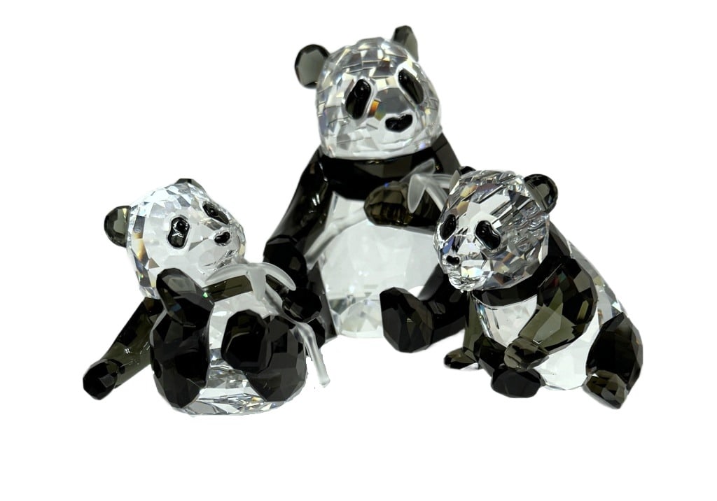 Swarovski 2008 Pandas SCS Annual Edition Figure: Item/Description: Swarovski Crystal Society (SCS) Annual Edition 2008 Panda figurines of a mother and baby panda cubs holding bamboo. Designed by Heinz Tabertshofer, this piece marks the first