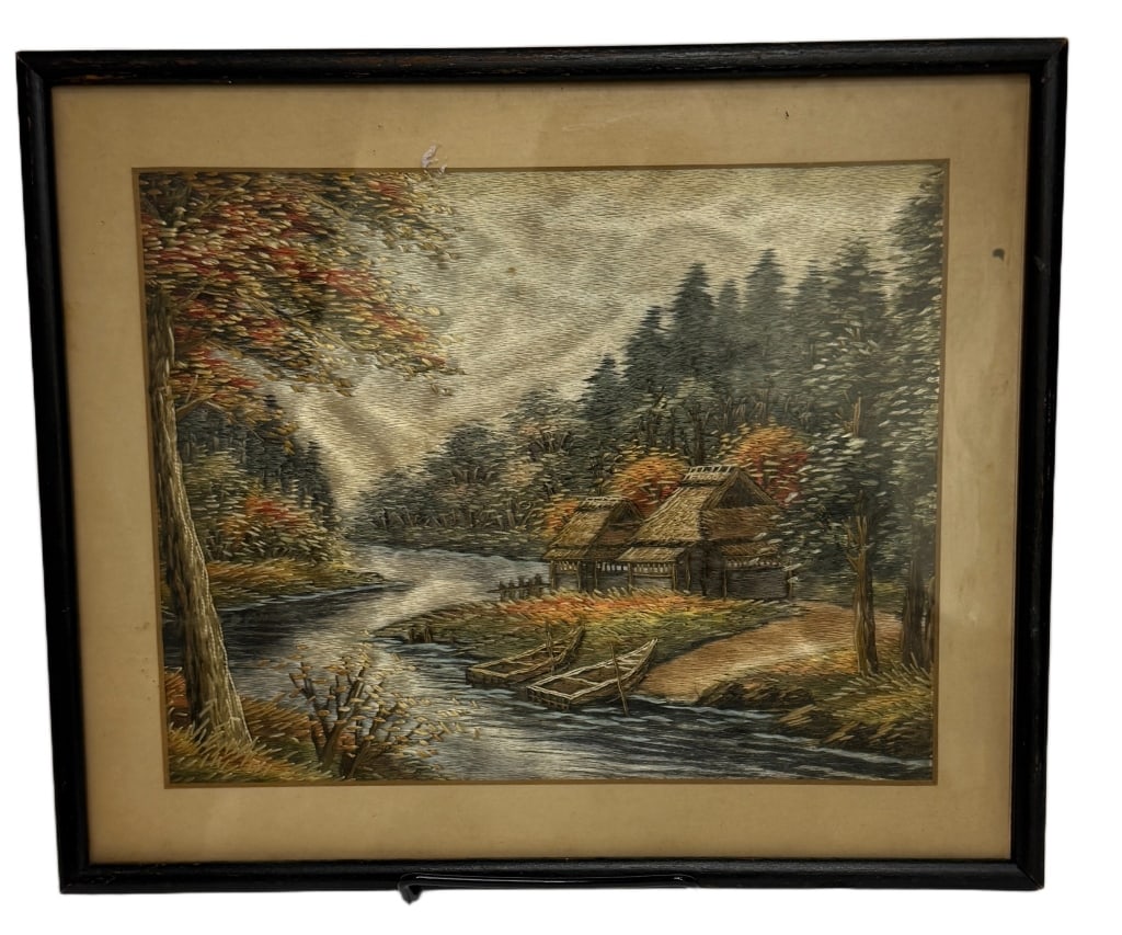 Riverside Landscape Straw Mixed Media: Item/Description: A mixed media landscape depicting a riverside with cottages, trees, and boats, composed of split and dyed straw arranged to create tonal shading. Mounted and glazed in a