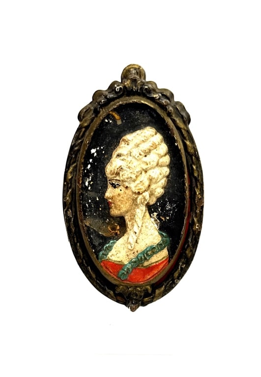 1920s Waverly Studios Cast Iron Door Knocker: Item/Description: Antique art-deco cast iron door knocker manufactured by Waverly Studios. The portrait depicts a lady in profile with an elaborate 18th-century style coiffure and dress, showcasing