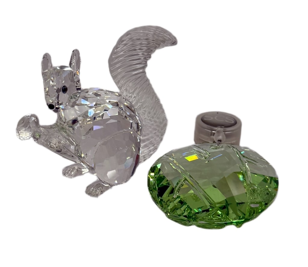 Swarovski Squirrel & Peridot Suncatcher Crystals: Item/Description: Featuring two Swarovski Crystals. SCS 10th Anniversary "The Squirrel" designed by Anton Hirzinger and released for one year only in 1997 to commemorate the 10th anniversary of the Sw