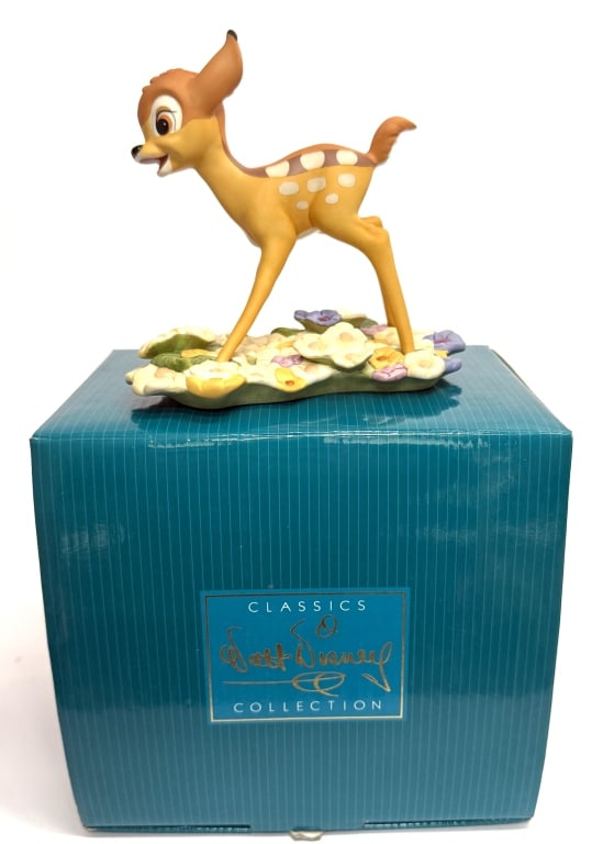Walt Disney Classics Bambi "Purty Flower" Figure: Item/Description: Walt Disney Classics Collection (WDCC) "Purty Flower" Bambi. The figurine depicts Bambi standing on a base covered in flowers. The title comes from a memorable scene in the film wher