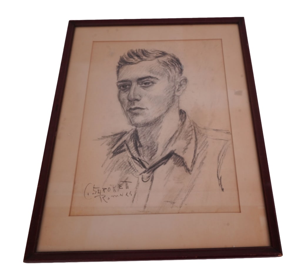 Saporetti - 1955 Roma Portrait of a Man: Item/Description: Portrait sketch drawing of a clean-cut man. Signed and dated lower right: "C. Saporetti / Roma 55". Framed under glass. Material: Graphite on Paper Dimensions: Height: 17"; Width: 12