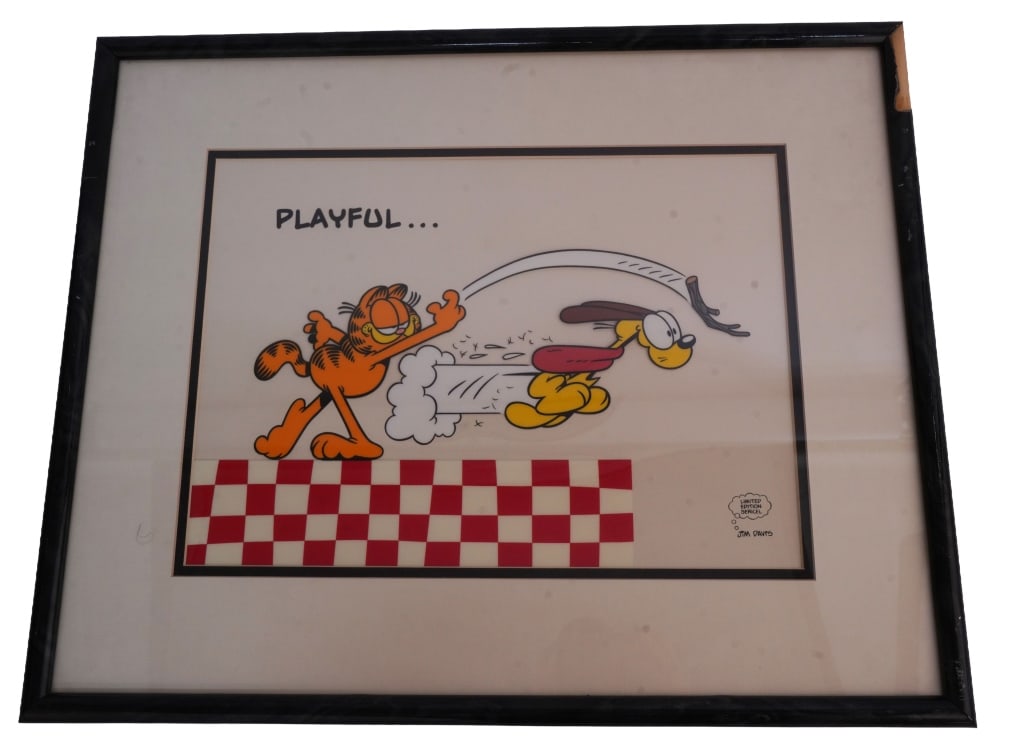 Jim Davis Garfield "Playful" Animation Sericel: Item/Description: Limited edition Jim Davis Garfield sericel "Playful" featuring Garfield and Odie. Material: Celluloid, Wood Frame Dimensions: Image size: Height: 11"; Width: 15". Framed: