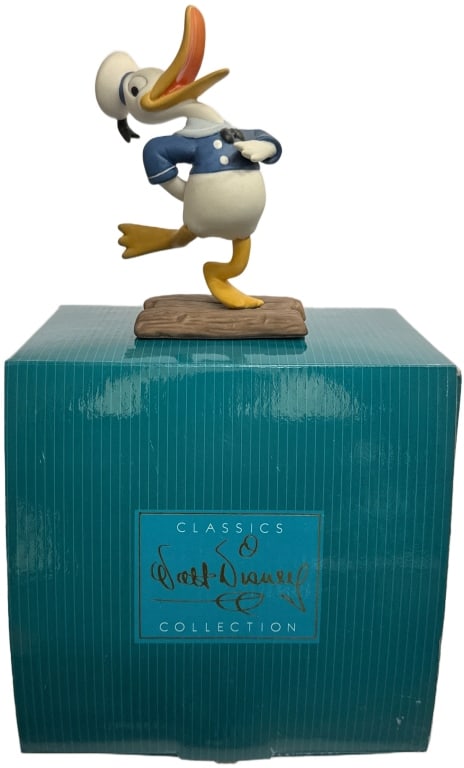 Disney Classics "Donald's Debut" Porcelain Figure: Item/Description: "Donald's Debut" figurine from the Walt Disney Classics Collection (WDCC) 1997 Gold Circle Exclusive, only available that year. It depicts Donald Duck in his first screen appearance