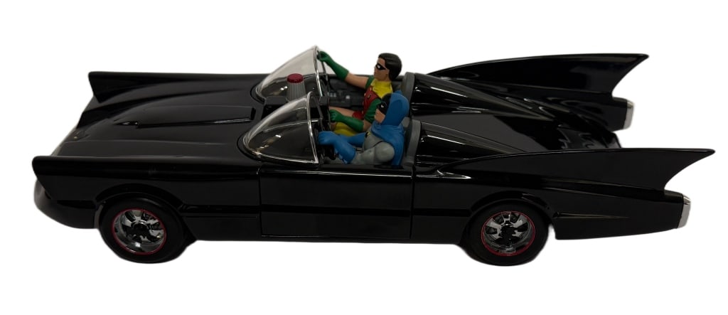 Batman & Robin Batmobile Die-Cast Model Car: Item/Description: 1:24 scale die-cast metal model of the Batmobile as depicted in 1960s-era DC publications and television styling, finished in gloss black with red-accented wheels and bat emblems at