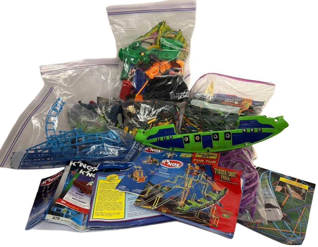 K'nex Toy Building Sets - Pirate Ship Park: Item/Description: K'NEX rod and connector building sets including pieces from Ferris Wheel, Cross Fire Chaos Rollercoaster, Pirate Ship Park, Renegade Run Coaster, and Screaming Serpent. Material: Mix