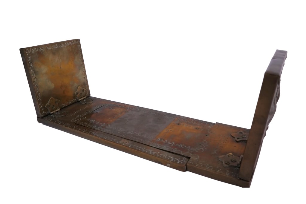 Antique Adjustable Brass Book Slide: Item/Description: Antique adjustable brass book slide featuring telescoping center extension and upright end supports with engraved decorative borders. Constructed from heavy gauge brass with hand-ham