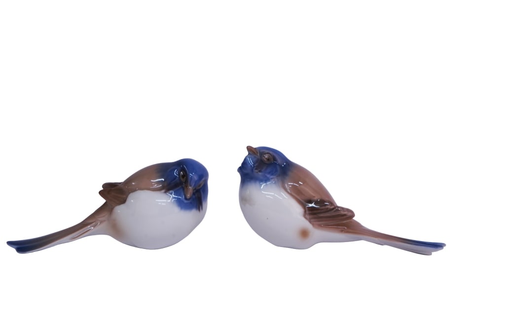 B&G "The Optimist & The Pessimist" Titmouse Birds: Item/Description: Pair of Bing & Grondahl porcelain titmouse figurines titled "The Optimist" (#1633) and "The Pessimist" (#1635), designed by Dahl-Jensen, mid-20th century. Each bird is modeled in