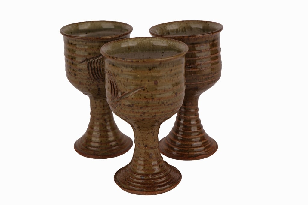 Studio Art Pottery Stoneware Goblets: Item/Description: Three glazed stoneware chalice cups. Makers marks to base. (Beaufort Pottery) Material: Glazed Pottery Dimensions: Length: 3 1/2"; Width: 3 1/2"; Height: 6" Condition: Signs of age
