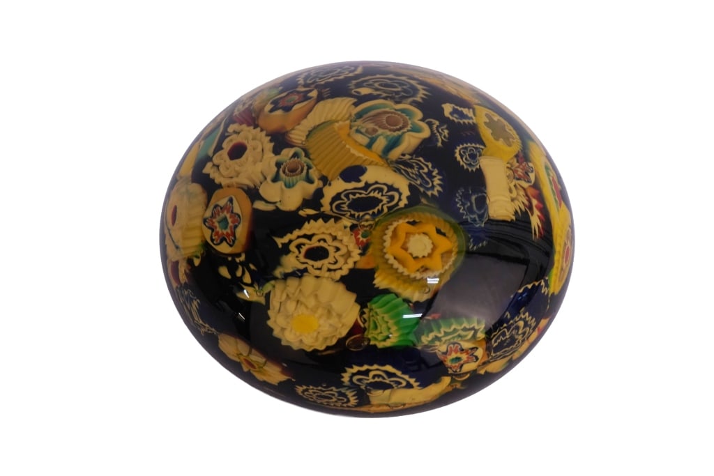 Murano Millefiori Art Glass Paperweight: Item/Description: Italian art glass paperweight made using the "millefiori" technique, which involves embedding intricate flower-like glass canes into a clear or colored glass base. Pontil to base.