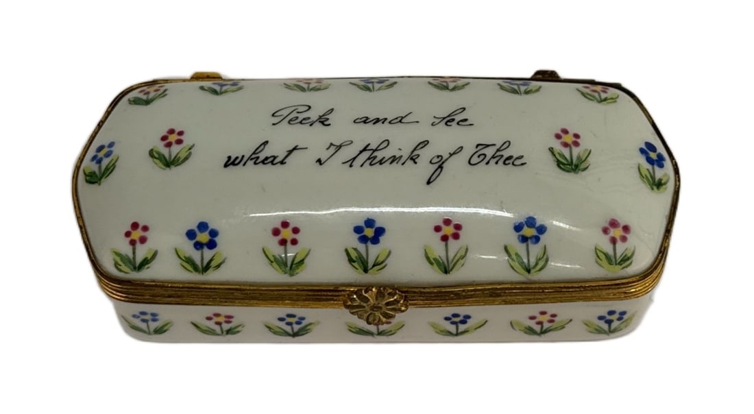 Tiffany & Co Private Stock Limoges Trinket Box: Item/Description: Tiffany & Company Private Stock hand painted rectangular Limoges trinket box, numbered 320; white porcelain with flowers and the phrase "Peek and See what I think of Thee" to the lid
