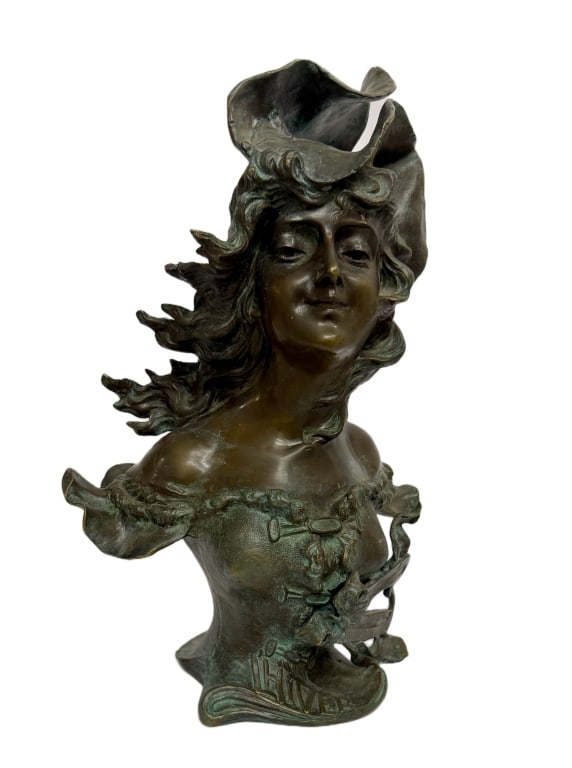 Franz Iffland - Art Nouveau Bronze "L'hiver": Item/Description: Bronze Art Nouveau sculpture. Bust of a young woman, with flowing hair, wearing a winter hat. Titled on the lower front; "L'hiver" (Winter) and signed on side. Franz Iffland (German,