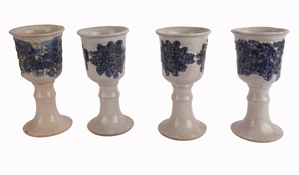 Studio Art Pottery Chalices: Item/Description: Unsigned grouping of studio pottery chalices featuring cobalt and forest hued textured floral-like design. The painted designs on each chalice range from distinctly floral to more