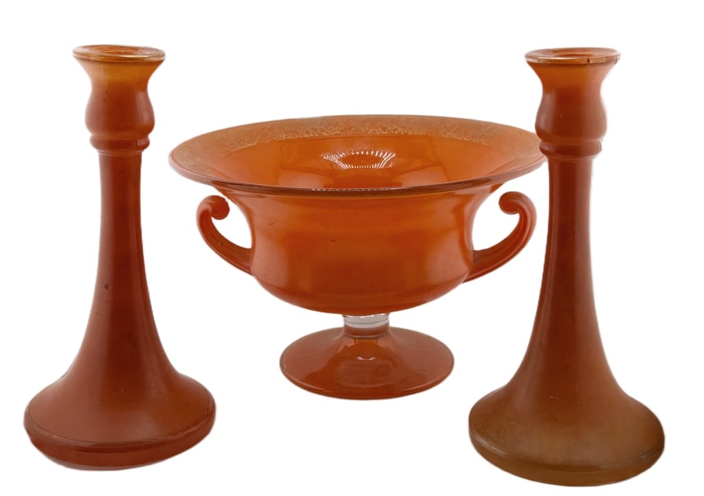 Art Deco Orange Tango Glass Centerpiece Set: Item/Description: Art Deco opaque orange Tango Glass centerpiece set. Circa 1920s-1930s. Grouping includes console bowl with applied handles and a pair of matching taper candlestick holders. Wide