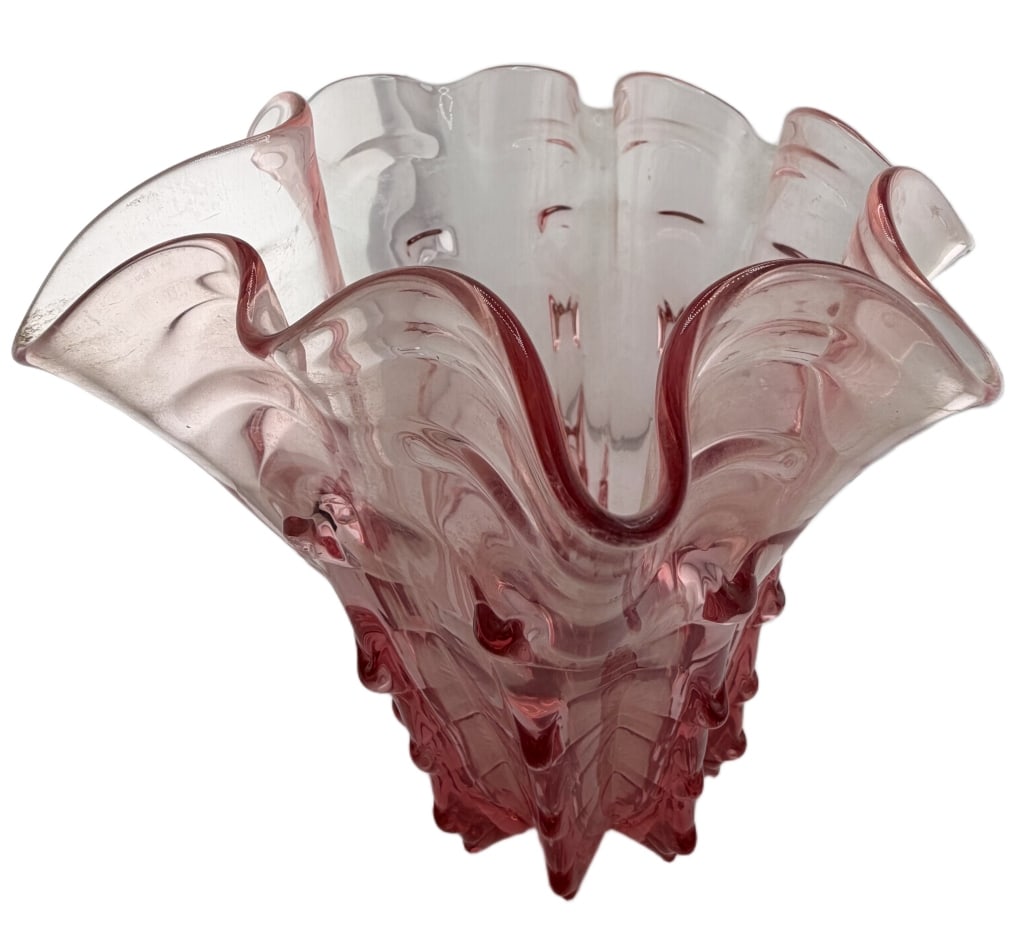 Mid-Century Pink Bohemian Glass Vase: Item/Description: Mid-century vintage hand-blown pink art glass vase. Vessel features a tapered, cylindrical body with deep vertical ribbing that extends into a distinctively ruffled or scalloped rim.
