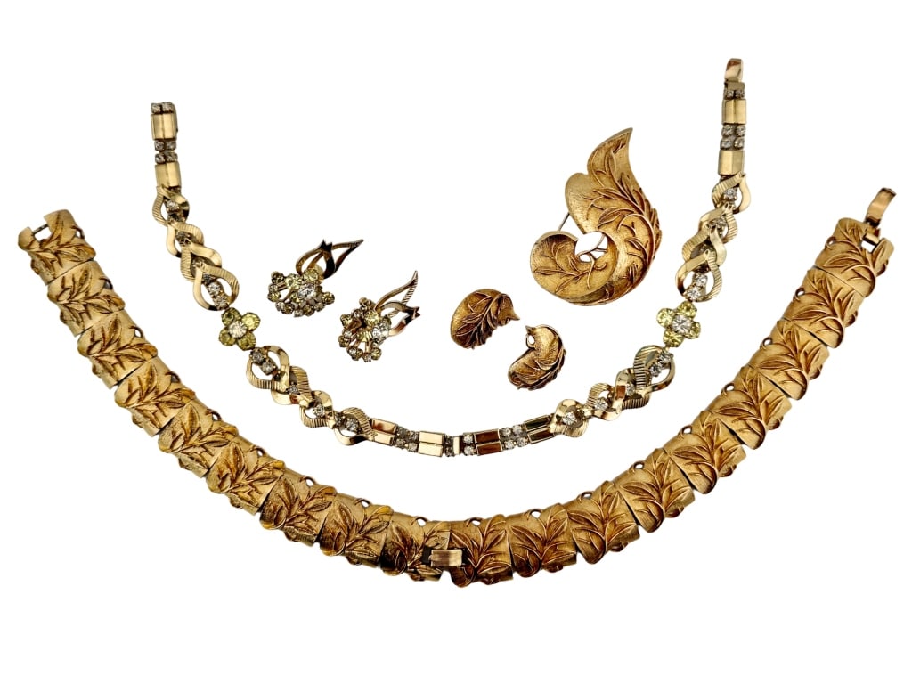 Sarah Coventry Golden Brocade Monte Carlo Parures: Item/Description: Gleaned from the same estate are two Mid Century signed Sarah Coventry parure sets. Both crafted in gold tone metal with brushed, textured and shiny finishes, organic designs of leav