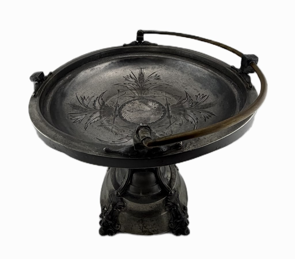 Victorian Silver-Plated Bride's Basket Base: Item/Description: Antique Victorian silver-plated bride's basket frame. Late 19th century, circa 1880s-1890s. Ornate table centerpiece features a wide, circular dish receptacle intricately hand-engrav