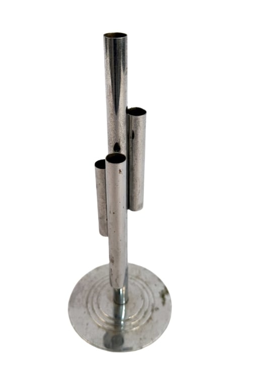 American Art Deco Chase Chrome Skyscraper Bud Vase: Item/Description: An American Art Deco Machine Age bud vase designed by Ruth and William Gerth for the Chase Brass & Copper Company. The modernist architectural silhouette is composed of a central cyl
