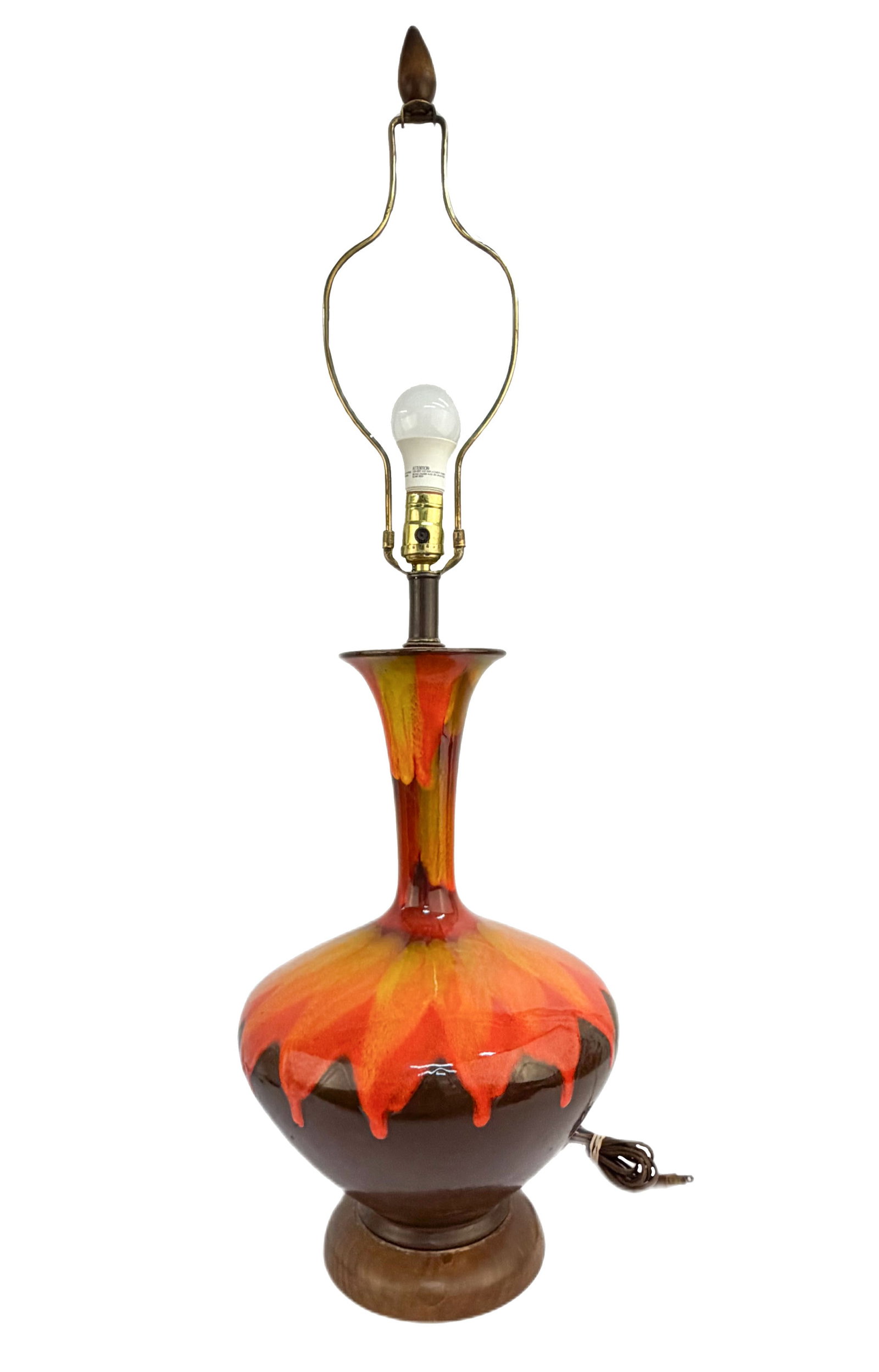 MCM Volcanic Drip Glaze Ceramic Table Lamp: Item/Description: 1960s Mid-Century Modern "Fat Lava" ceramic table lamp. Bulbous base tapering into a long, flared neck. With orange and yellow volcanic drip glaze over a dark brown base. No shade. C