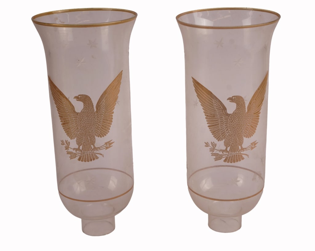 Federal Style Etched Eagle Glass Hurricane Shades: Item/Description: A matching pair of vintage architectural glass hurricane lamp shades, circa mid-20th century. Crafted from thin, hand-blown clear glass, each shade features a classic flared hurrican