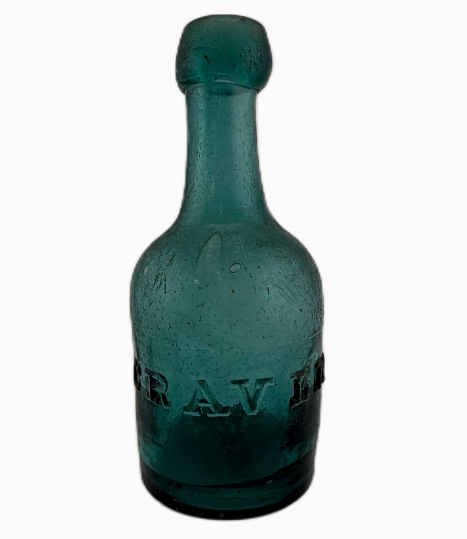 Victorian Craven Manchester Teal Glass Soda Bottle: Item/Description: Antique British mineral water / soda glass bottle manufactured for Austin Craven Limited of Manchester, England, circa 1880s-1900s. The English carbonated beverage company operated d