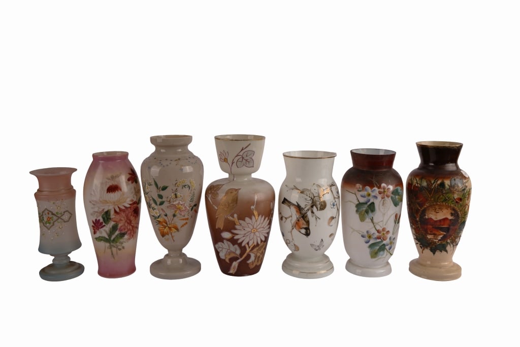Bristol-Style Hand-Painted Floral Glass Vases: Item/Description: Collection of seven hand-painted semi-opaque opal glass and milk glass cabinet vases, Late 19th-century Victorian era to the mid-20th century. Hand-painted enamel and gilt decoration
