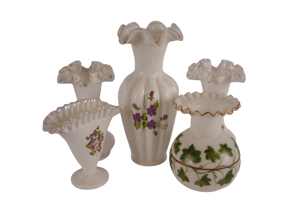 Fenton "Violets in the Snow" Milk Glass Vases: Item/Description: Collection of four Fenton Art Glass pieces in the "Violets in the Snow" pattern. Featuring hand-painted purple violet blossoms paired with green leaves and ruffled edges / rims. Also
