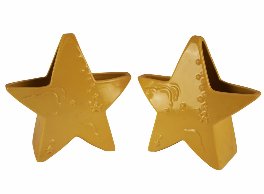 Abingdon Art Pottery Star-Shaped Ceramic Vases: Item/Description: Pair of vintage Abingdon Art Pottery star-shaped vases / planters with a yellow glaze. Both are marked with ABINGDON, U.S.A. ink stamp to bottoms and feature a whimsical five-point s