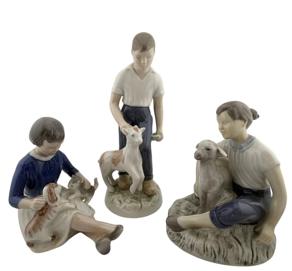 Bing & Grondahl Danish Porcelain Figurines: Item/Description: A collection of three vintage Danish pastoral porcelain figurines manufactured by Bing & Grondahl, circa mid-to-late 20th century. Rendered in the company's signature Scandinavian